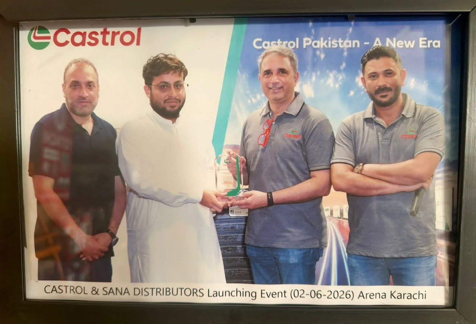 Khan Oil Works representative receiving industry recognition at a Castrol Pakistan event
